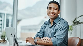 man s or s smiling laptop gettyimages