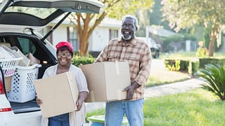 senior couple moving boxes gettyimages