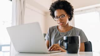 serious person staring at laptop