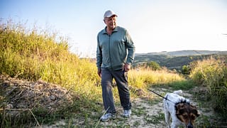 older man walking doggettyimages