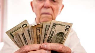 senior fanning cash retirement social security getty