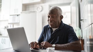 senior man laptop gettyimages
