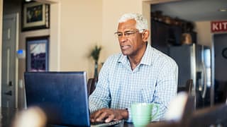 senior man laptop gettyimages