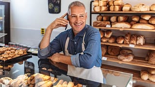 senior man working in bakery gettyimages