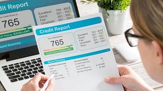 PersonLookingUpCreditScore.width .jpg