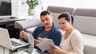 couple organizing paperwork.width