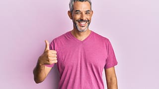 getty thumbs up satisfied pleased.jpg