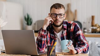 man s bored at laptop gettyimages