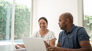 mature couple doing taxes FlzKDuS.width