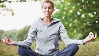 mature woman meditating calm.jpg