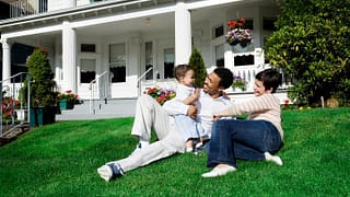 parents and baby in front yard PsaVe.width