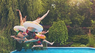 people jumping in pool RyUDQ.width .jpg