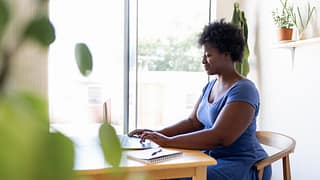 person working at home on laptop eHAgcI.width