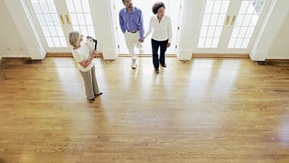 two people with realtor in house EOhMdBw.width