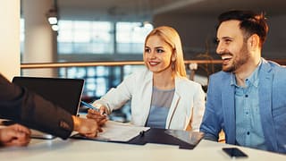 Couple signing contract HdgFNU.width .jpg