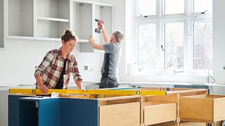 Man and woman working on a kitchen remodel TD.width .jpg