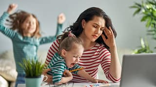 Stressed mom with kids aPoOU.width .jpg
