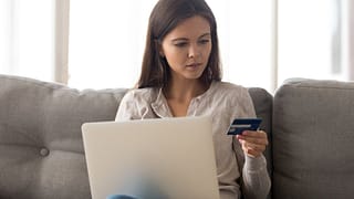 Woman with credit card laptop XrheSHb.width .jpg
