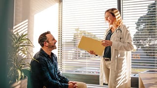 doctor with patient in office.width .jpg