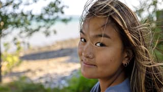 getty windblown hair smiling.jpg