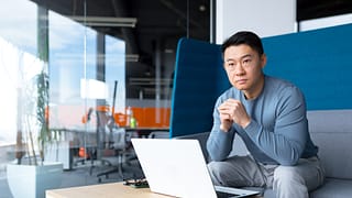 middle aged asian man laptopgettyimages .jpg