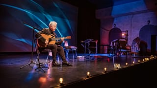 older man guitar stage gettyimages .jpg
