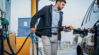 person pumping gas into car WkyEFR.width .jpg