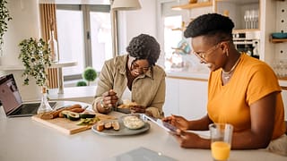 two people in kitchen oWgTzUh.width .jpg