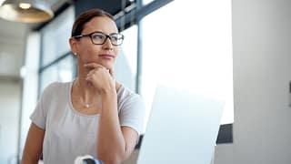 woman at laptop confident gettyimages .jpg