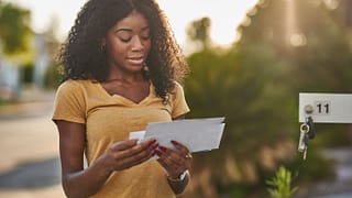 woman at mailbox.width .jpg