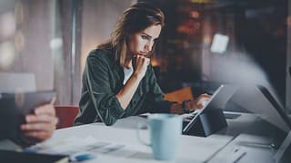 woman studying tablet PVHKw.width .jpg
