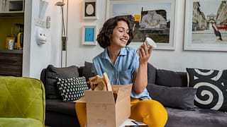 woman unpacking delivery oQULHp.width .jpg