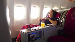 Airplane passenger flying business class cwqh.width .jpg