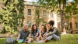College students studying on grass KaLEug.width .jpg