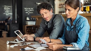 Couple reading bills jplwGA.width .jpg