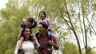Happy family young kids outdoors.width .jpg
