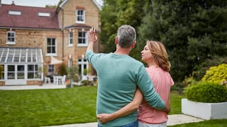 Older couple look at a home cQcWIq.width .jpg