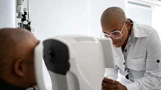 Person getting their eyes scanned by tech. ji.width .jpg