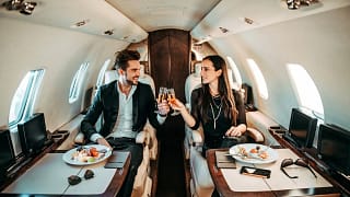 Successful couple making a toast with champag.width xXDQko.jpg