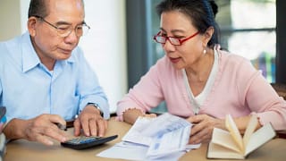 concerned senior asian couple.jpg