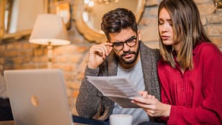 couple looking at bills .jpg
