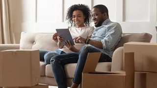 couple with moving boxes.width .jpg