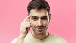 getty finger on forehead head smart move savvy good idea.jpg