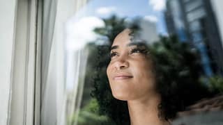 getty grateful thankful thinking smiling looking up.jpg