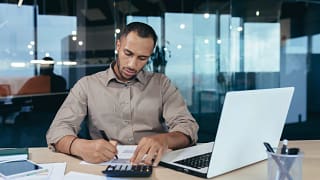 man s s laptop calculator gettyimages .jpg