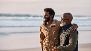 man with father on beach FEHtyJ.width .jpg