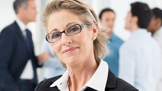 mature woman smiling happy businesswoman.jpg