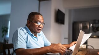 older man at laptop gettyimages .jpg