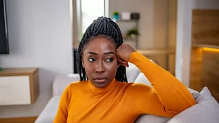 person looking stressed on couch JHTgI.width .jpg