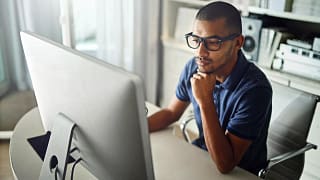 serious young man at computer.width .jpg
